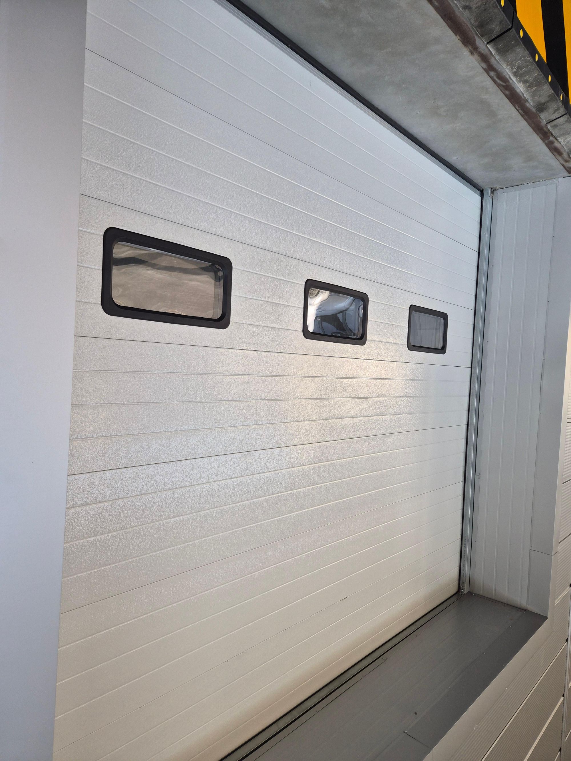 ODM Industrial Sectional Doors: Tailored Durability for Heavy-Duty Applications